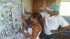 Foto de Joven Wendy Blayath, estudiante del tecnico basico haciendo disgnostico de vulnerbilidad ente el Cambio climatico en comunidad de  tiktik kaanu