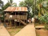Foto de casa de tambo en la comunidad de Rama cay